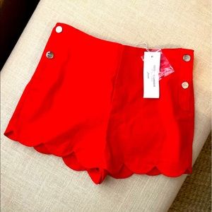 Scalloped red shorts. NWT